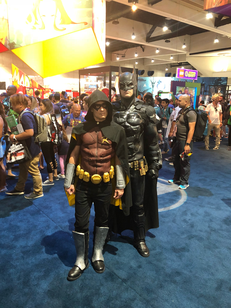 The Arkham video game incarnations of Batman and Robin take to the busy streets of the Comic-Con show floor.